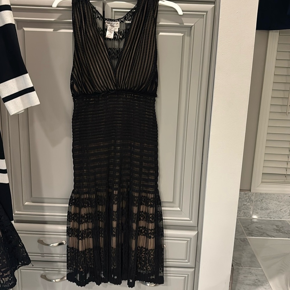 Sexy form fitting black lace dress